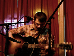 Musician inside Bremen Cafe